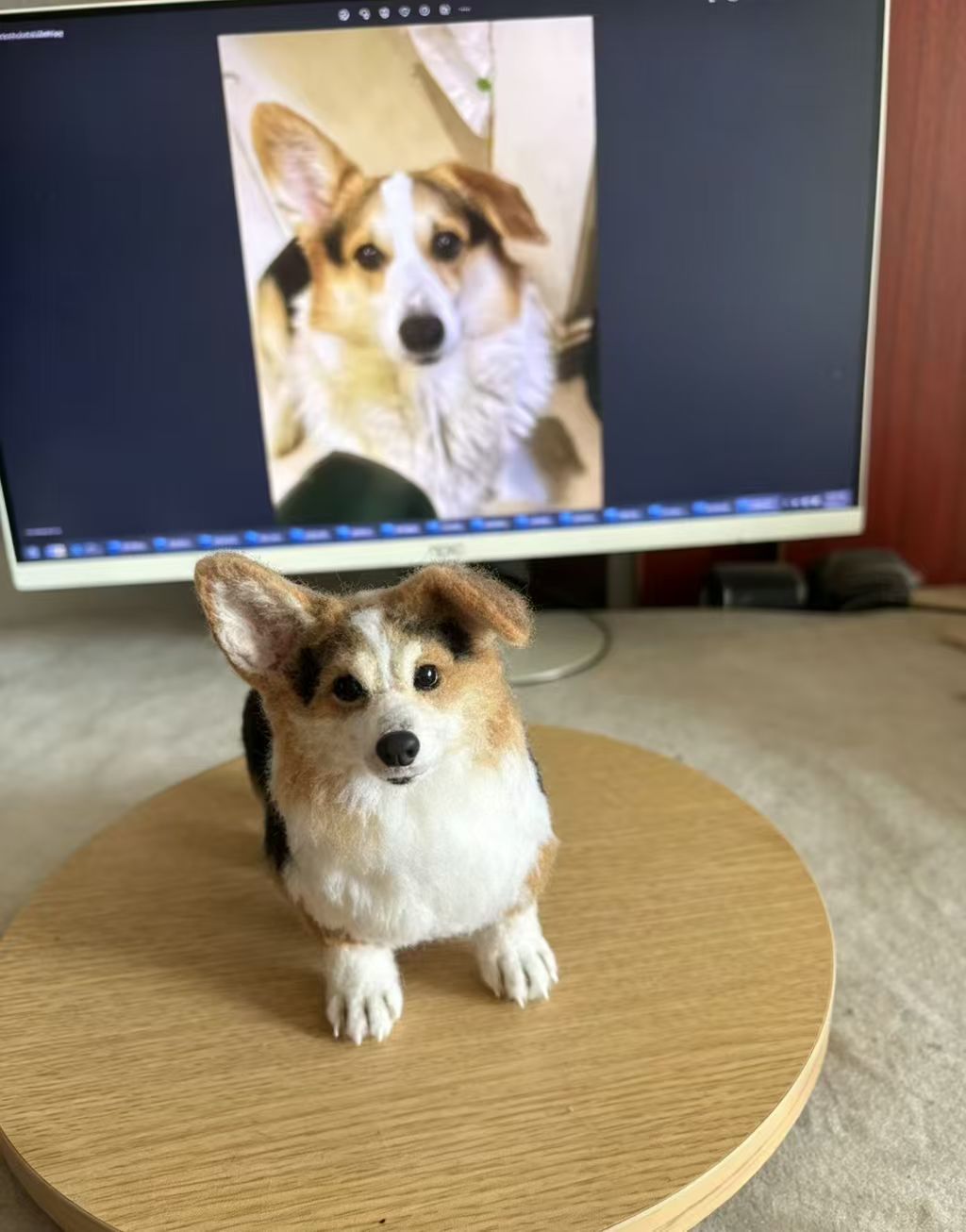 A handmade full-body wool corgi keepsake